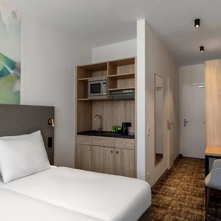 Отель Wyndham Garden Messe 4*